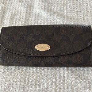 Coach Brown Leather Wallet with Flap Closure